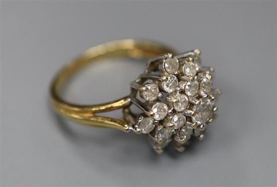 A modern 18ct gold and diamond cluster ring, size J, gross 4.2 grams.